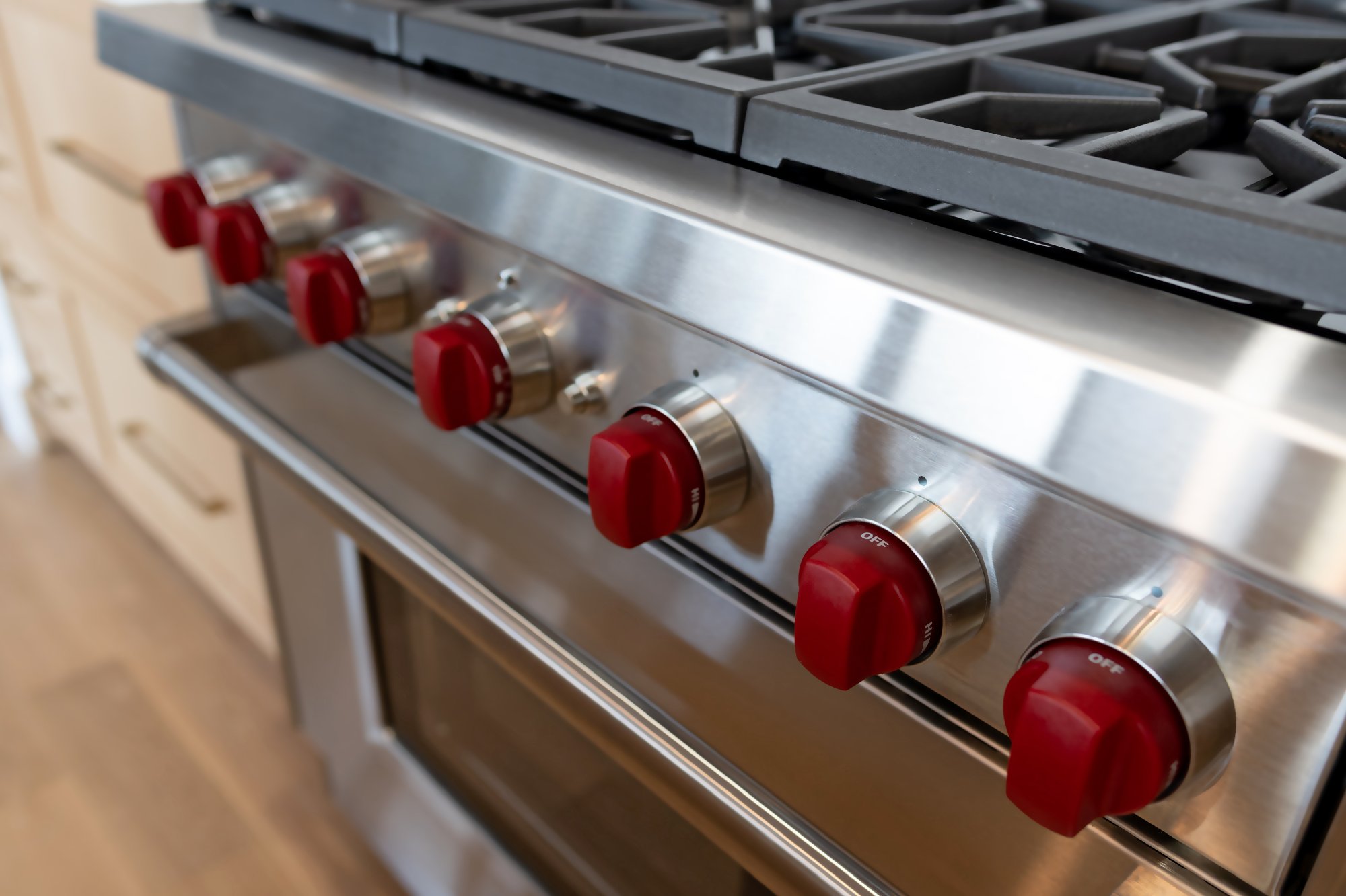 Chef kitchen island with brass fixtures